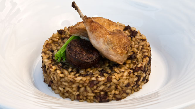 Rice with quail and Catalan blood sausage