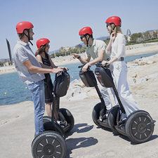 group on segway taking a tour along the coast of Barcelona