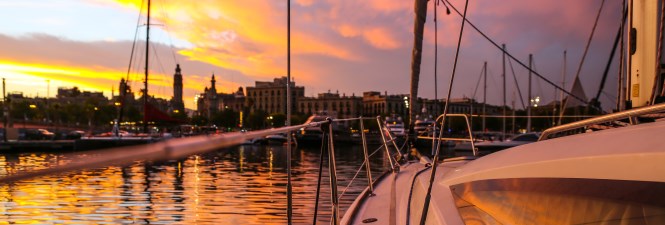 sunset on a sailing boat in Barcelona